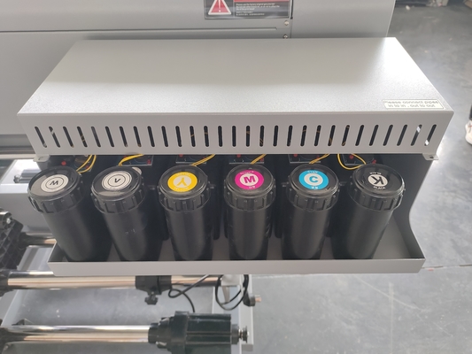 60cm 70cm UV DTF εκτυπωτής με τρεις TX800 3200 κεφαλές Epson AB ταινία UV κυλίνδρων Μηχανή μικρού μεγέθους